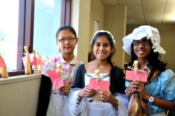 Westhoff students Michelle Jiang, Savarin Chilukuri and Natalie Olvera showed their cornhusk dolls.