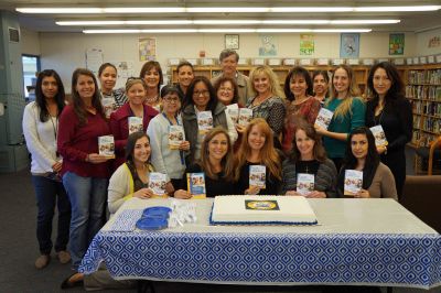 Photo courtesy: Gustavo Miranda Walmart and Sam’s Club presented 20 Walnut Avenue Elementary teachers with $50 gift cards for school supplies on Nov. 17.