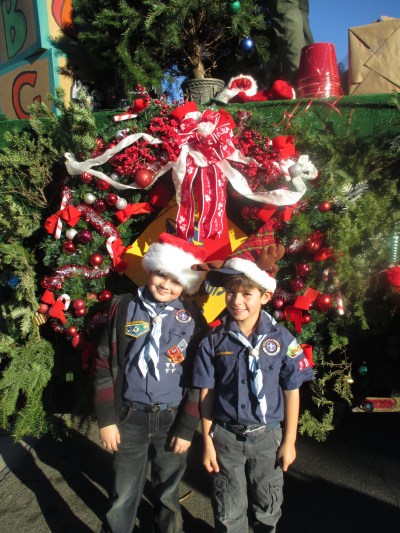 Photo By: Monique Valadez Ben Midlik and Adam Valadez from Pack #205 get ready to march. 