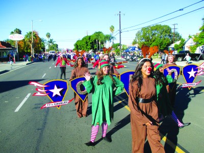 Photo by: Monique Valadez Chino High School Marching Band brings holiday cheer to Chino's Youth Christmas Parade. 