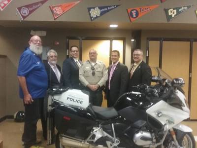 Photo by Emily Aguilar Eastvale's First Motor Officer with City officials at the Eastvale City Council meeting 