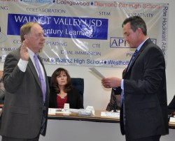 Photo courtesy: WVUSD Larry Redinger takes oath of office administered by Superintendent Dr. Robert Taylor. 