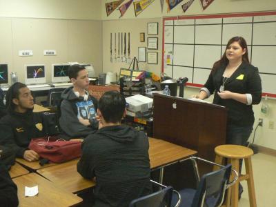Photo courtesy: CVUSD Brianna Smith Gunn (right), a 2008 Don Lugo High graduate, talks to Don Lugo seniors about her experience in the Army.