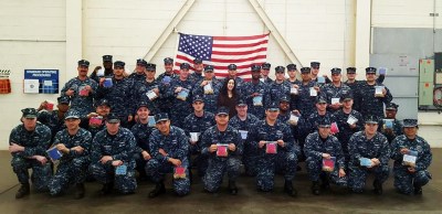 Photos courtesy of CVUSD Caitlyn Broad surrounded by Navy sailors and the goodie bags she made them