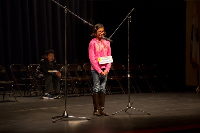 Photo courtesy: CNUSD  Aisha Randhawa of Garretson Elementary spells out her winning word to claim the District’s Spelling Bee title. 
