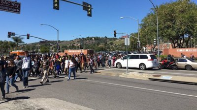 Photo by: Louie Ortega Mt. SAC students evacuate the campus after a bomb threat. 