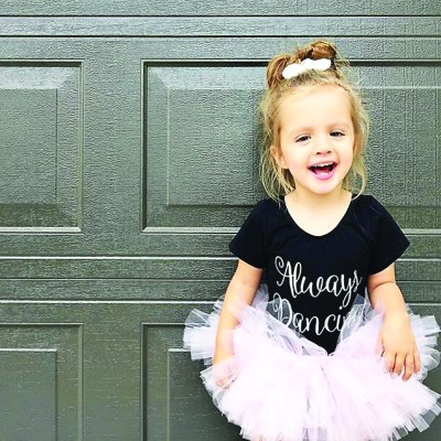 Photo courtesy: @fifiandmo Instagram Finley ready to dance with the community at the 65th Street LIVE Concert in the Park in Eastvale.