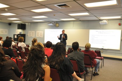 Superintendent Dr. Robert Taylor welcome residents to informational meeting on July 7.