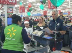 A Chino Valley Unified School District student checks out his purchases at the 2015 Make A Child event at the Walmart Supercenter in Chino. Photo courtesy: CVUSD 