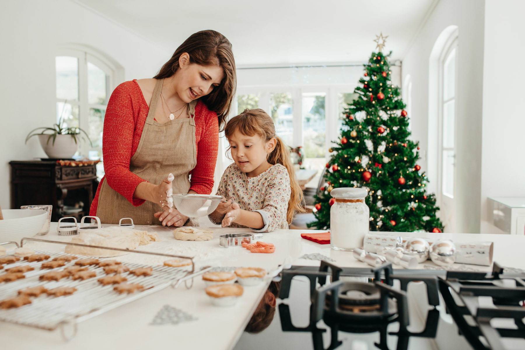 Mother and daughter baking. Photo Courtesy (c) Jacob Lund / stock.Adobe.com